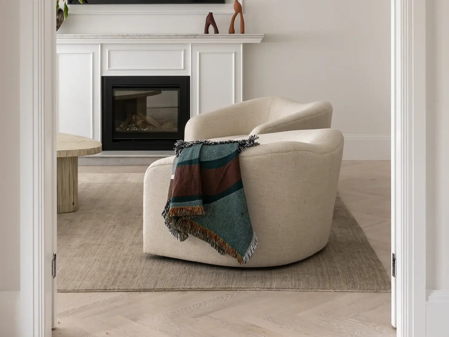 Dover Heights House living room featuring the Havwoods Alabastro Herringbone wood flooring.